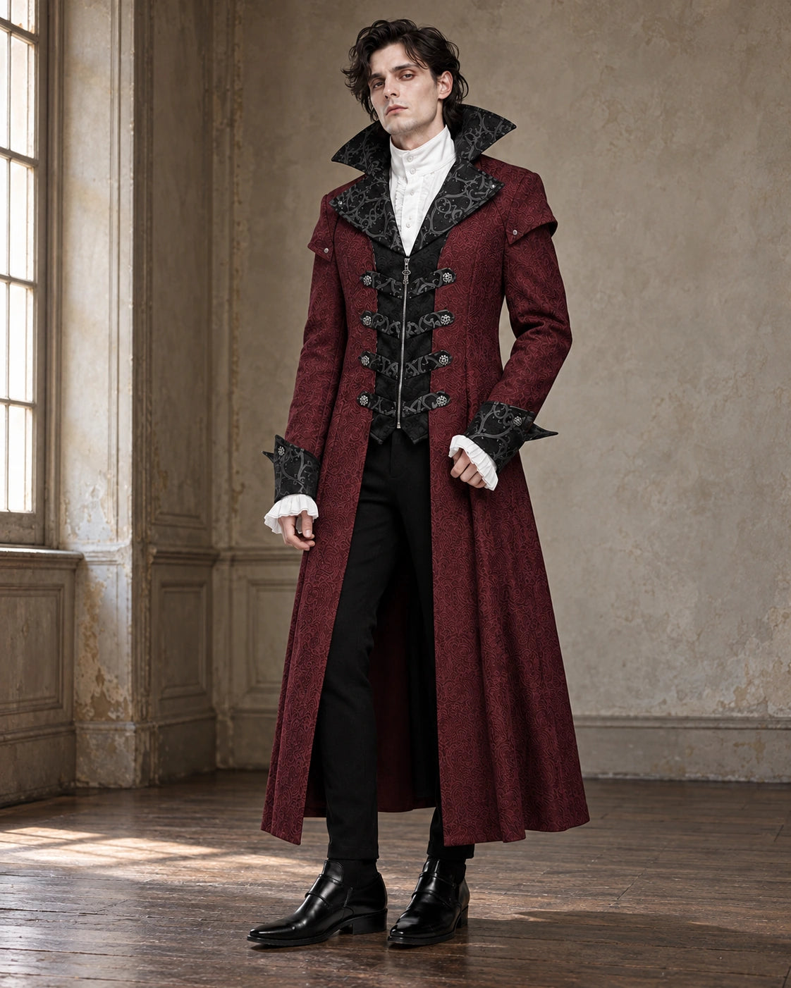 Model wearing a burgundy Gothic Victorian long coat in a softly lit room
