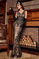 Elegante vestido de noche de lentejuelas y encaje con detalles de plumas