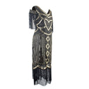 Vestido flapper con ribete de flecos y lentejuelas con set de accesorios