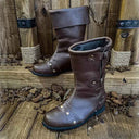 Botas altas de caballero medieval