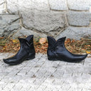 Botines medievales con cordones laterales