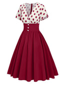 Robe midi cache-cœur à pois